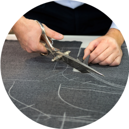 Designer is cutting fabric