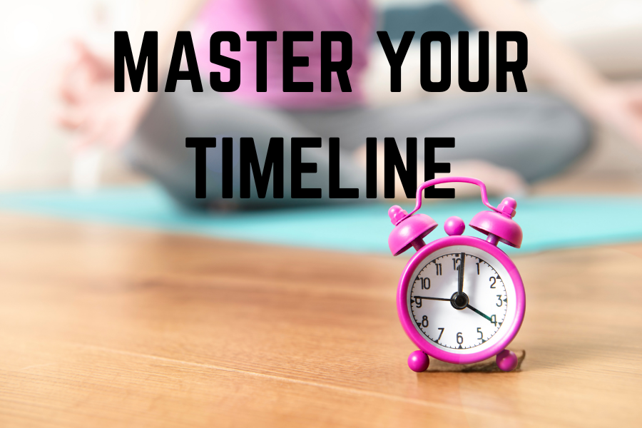 A close-up of a pink alarm clock, symbolizing the importance of mastering timelines in yoga apparel production.