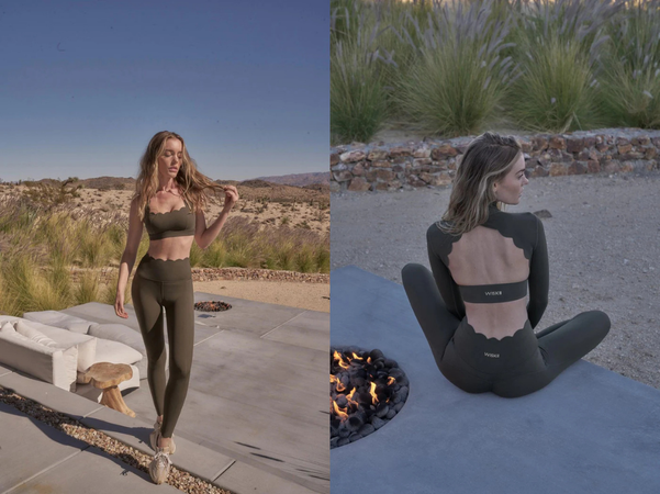 Woman wearing an olive green yoga set, posing outdoors with a focus on the stylish design and back details of the outfit.